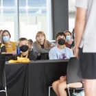 Audience at UISPEAKS camp kinnick tour 2022, photo by jtobin