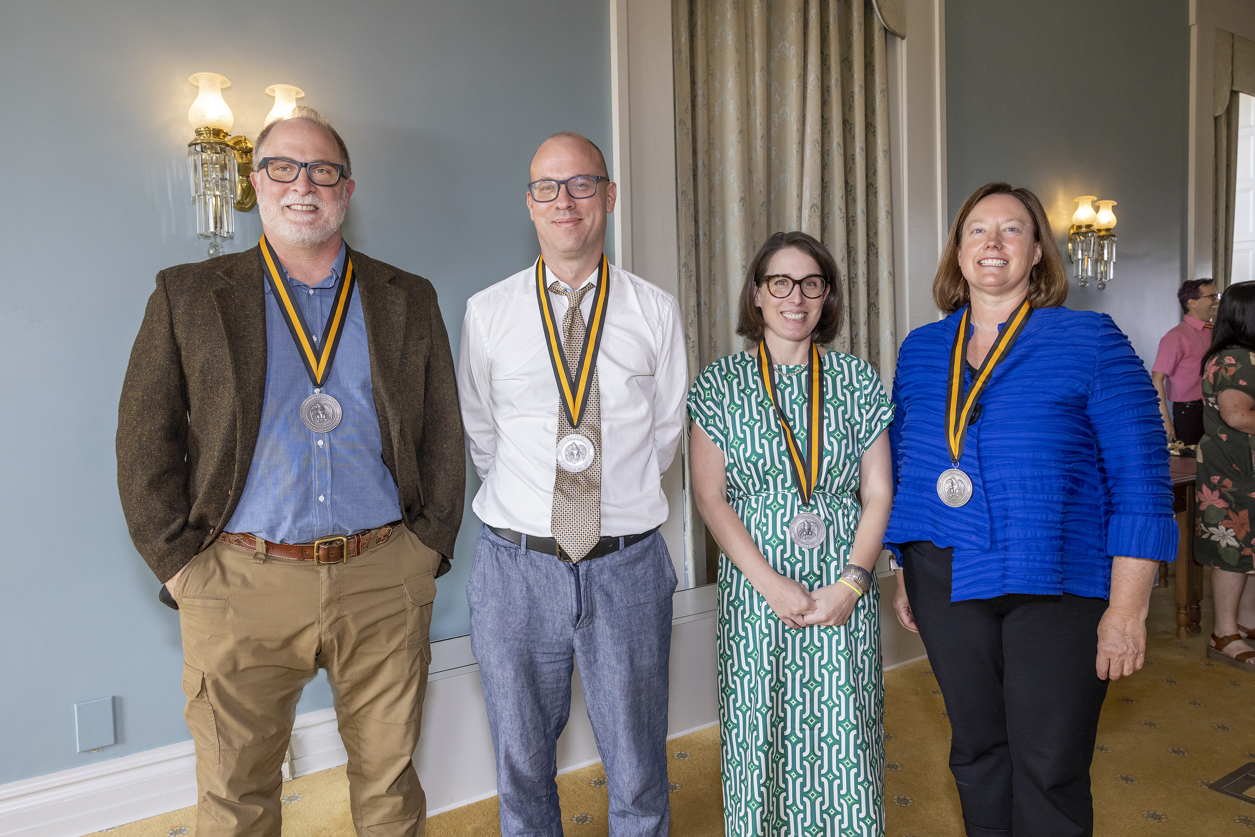 Group photo of Bob Cargill, Paul Dilley, Sarah Bond, and Brenda Longfellow, in the Old Capitol Senate Chambers