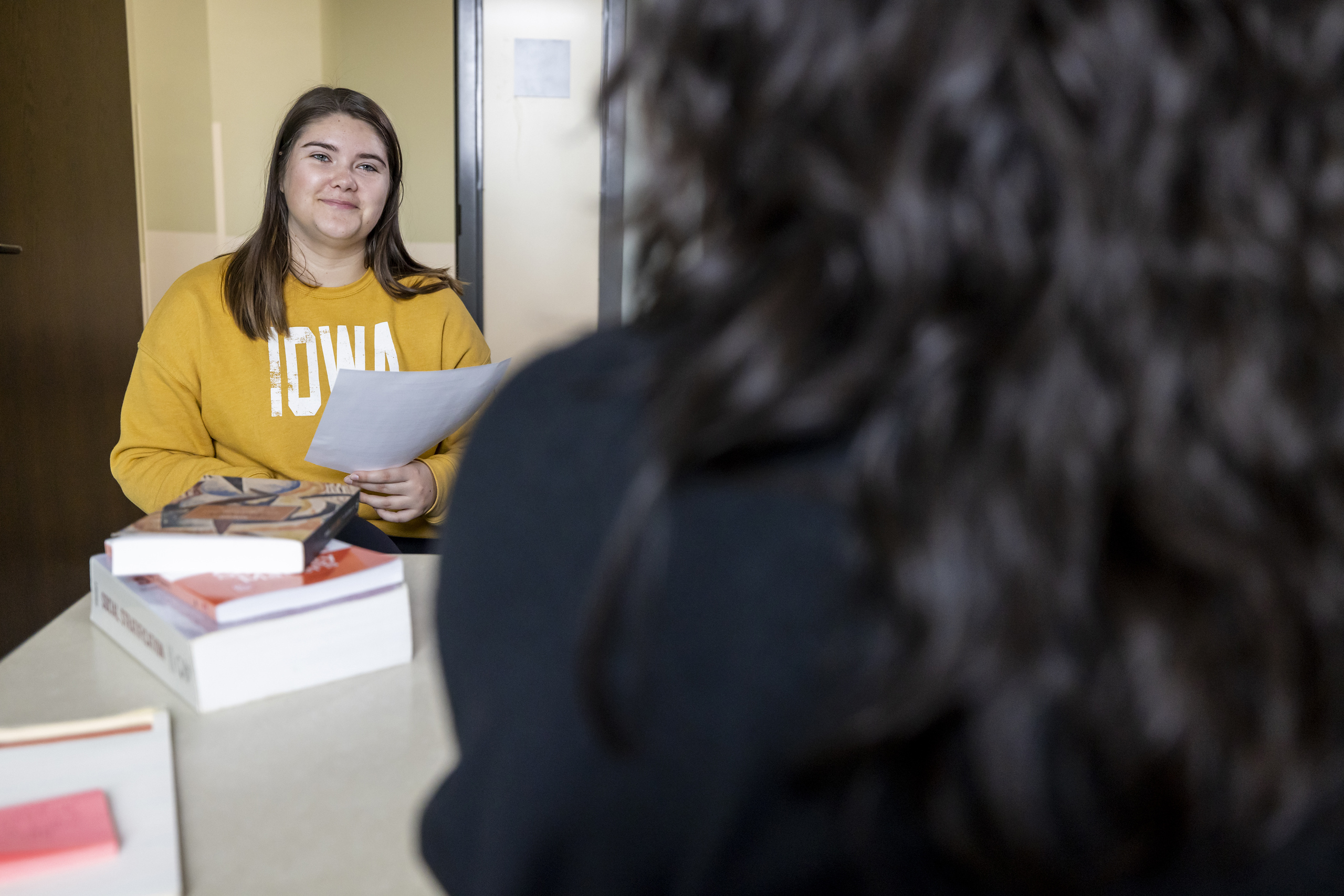 a student talking to her advisor