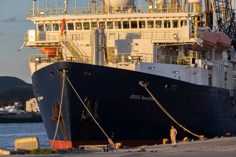 A large, seafaring ship photographed from the front 