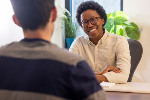 A CLAS faculty member meets with a student 