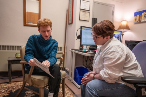 A student meets with their advisor