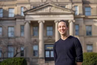 David Roth in front of Schaeffer Hall