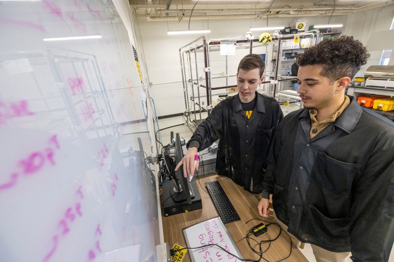 Picture of faculty and students working on the TRACERS project