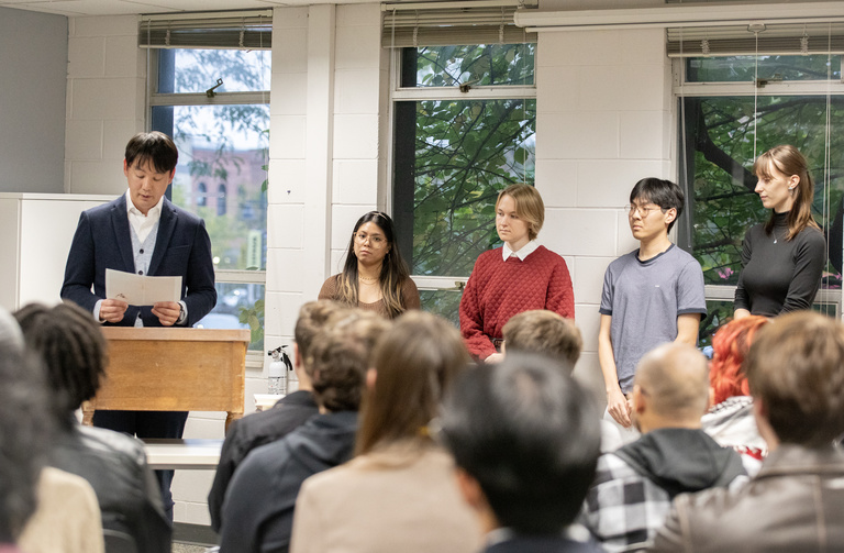 Students with the IWP writer they translated for